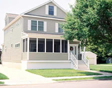 Custom modular floor plan designed by owner features an enclosed front porch, 4 bedrooms, large walk-up attic area and beautiful rear deck.